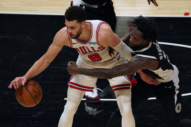 Jan 10, 2021; Los Angeles, California, USA; Chicago Bulls guard Zach LaVine (8) and LA Clippers guard Patrick Beverley (21) battle for the ball in the first half  at Staples Center.