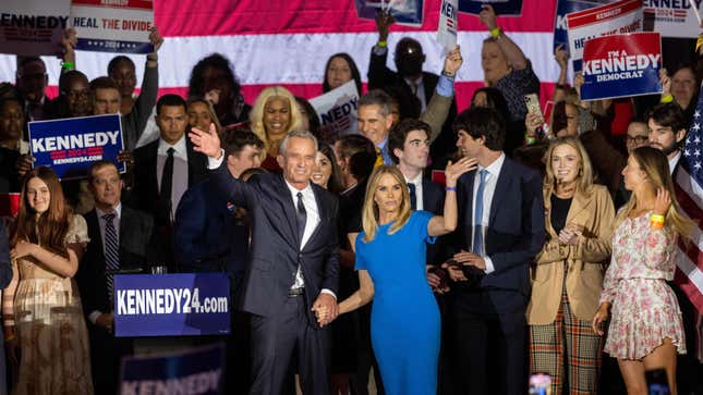 Robert F. Kennedy Jr. and his wife Actress Cheryl Hines wave to supporters on stage after announcing his candidacy for President on April 19, 2023 in Boston, Massachusetts.