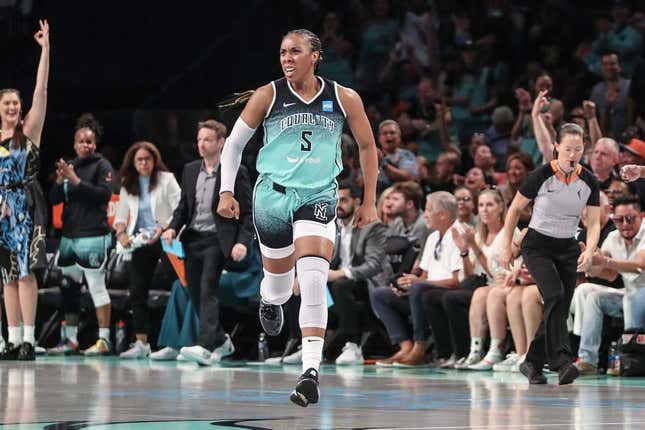 Aug 6, 2023; Brooklyn, New York, USA;  New York Liberty forward Kayla Thornton (5) celebrates after making a three point shot in the third quarter against the Las Vegas Aces at Barclays Center.