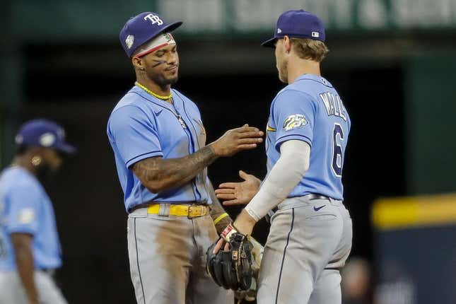 Apr 18, 2023; Cincinnati, Ohio, USA; Tampa Bay Rays shortstop Wander Franco (5) high fives second baseman Taylor Walls (6) after the victory over the Cincinnati Reds at Great American Ball Park.