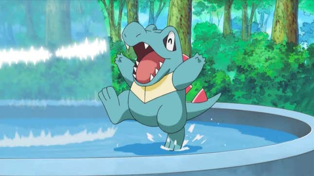 Totodile is seen playing in a fountain.