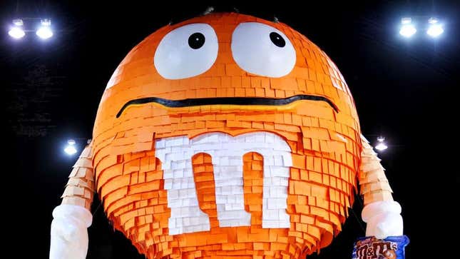 The 46-foot piñata was filled with thousands of M&amp;M’s pretzel packages