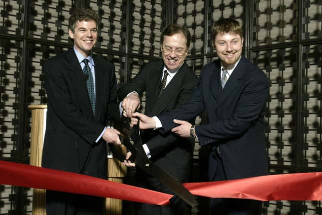 Executives cut the ceremonial red ribbon marking the grand opening of the newest LeMeridien luxury hotel June 6, 2003 in Minneapolis, Minnesota.