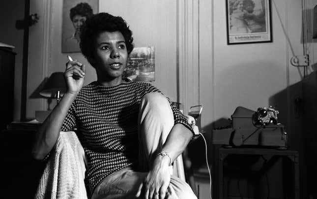 Writer and playwright Lorraine Hansberry poses for a portrait in her apartment in 1959 in New York City.
