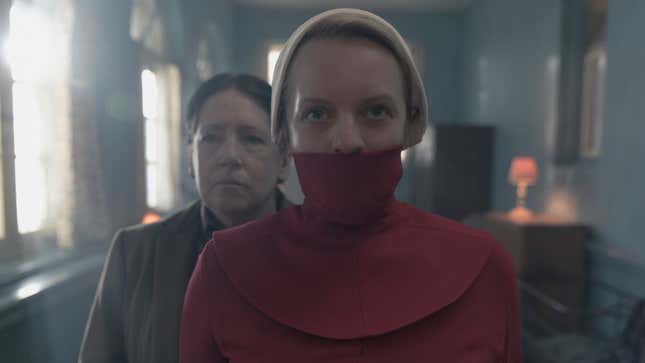 June (Elisabeth Moss) is forced to wear a gag while out in Washington D.C.