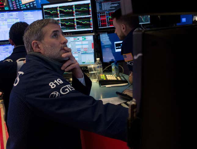 Image for article titled Dow Drops 600 Points Over Picture Of Worried Stock Broker Staring At Computer Screen