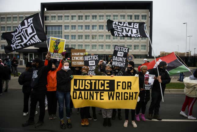 Protesters march from the Brooklyn Center police headquarters to a nearby FBI office on April 13, 2021 in Brooklyn Center, Minnesota. Demonstrations have become a daily occurrence since Daunte Wright, 20, was shot and killed by Brooklyn Center police officer Kimberly Potter on Sunday. 
