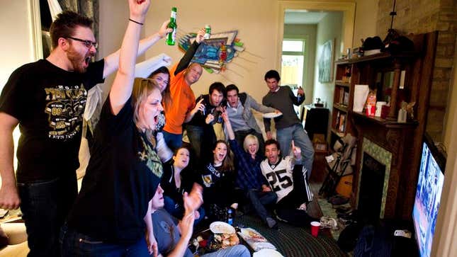 Image for article titled In Face Of Adversity, Heroic NFL Fans Continue Watching Football