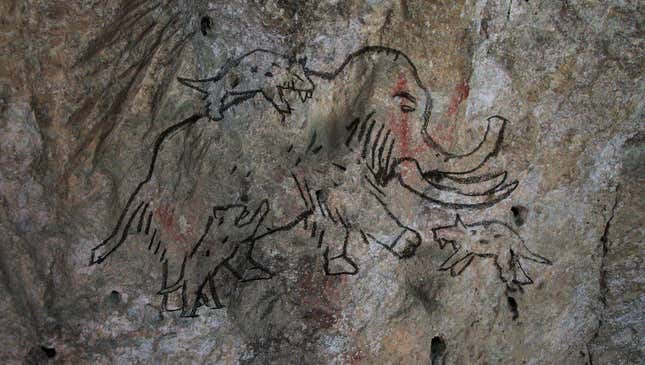Image for article titled Unearthed Cave Painting Of Wooly Mammoth, Saber-Tooth Tiger Reveals Humans Have Debated What Things Would Win In A Fight Since 30,000 B.C.