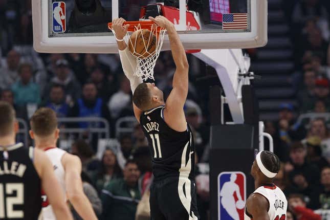 Apr 19, 2023; Milwaukee, Wisconsin, USA; Milwaukee Bucks center Brook Lopez (11) dunks during the first quarter against the Miami Heat during game two of the 2023 NBA Playoffs at Fiserv Forum.