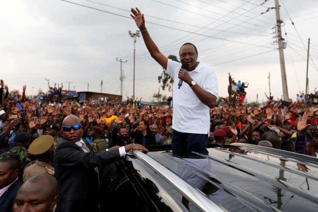Kenya's President Uhuru Kenyatta addresses his supporters at Burma market after his election win was declared invalid by the Supreme Court in Nairobi, Kenya, September 1, 2017.