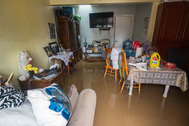 Floodwaters stand inside Jose Garcia’s home on College Road in Watsonville, California on March 10, 2023.