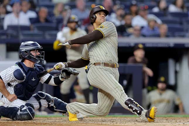 May 26, 2023; Bronx, New York, USA; San Diego Padres left fielder Juan Soto (22) follows through on a two run home run against the New York Yankees during the fifth inning at Yankee Stadium.