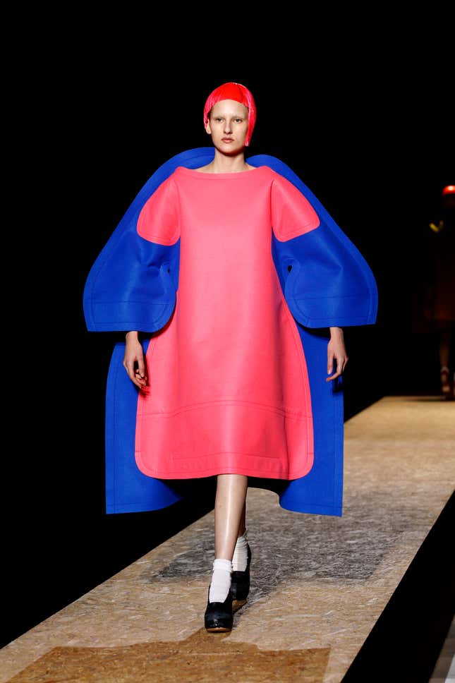 A model wears a creation for Comme des Garcons as part of the Fall-Winter, ready-to-wear 2012 fashion collection, during Paris Fashion week, Saturday, March 3, 2012. (AP Photo/Remy de la Mauviniere)