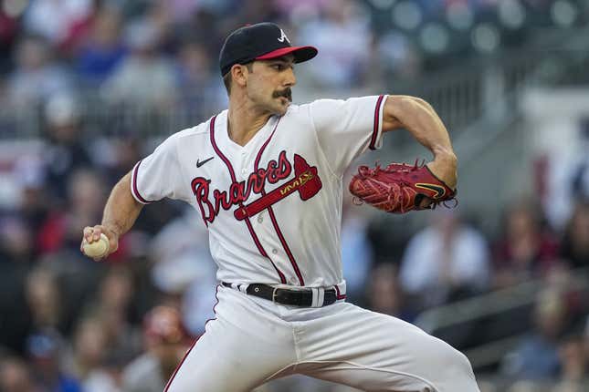 Apr 12, 2023; Cumberland, Georgia, USA; Atlanta Braves starting pitcher Spencer Strider (99) pitches against the Cincinnati Reds during the first inning at Truist Park.