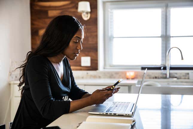 Black Woman Working On Laptop