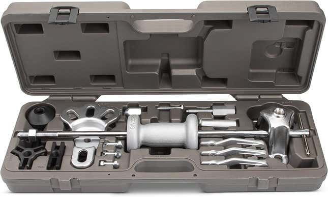 A grey blow-molded case with a slide hammer and assorted accessories.