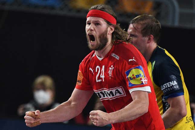 Denmark’s left back Mikkel Hansen celebrates a goal during the 2021 World Men’s Handball Championship final match between Denmark and Sweden.