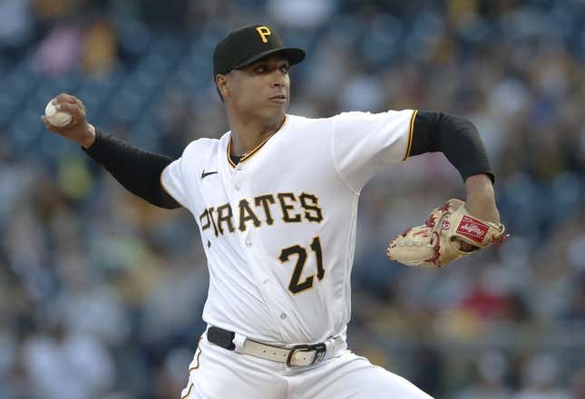 Sep 15, 2023; Pittsburgh, Pennsylvania, USA;  Pittsburgh Pirates starting pitcher Johan Oviedo (24 wearing 21) delivers a pitch against the New York Yankees during the first inning at PNC Park.