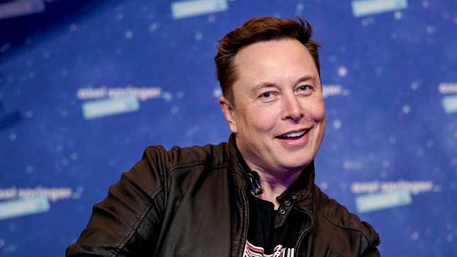 A photo of billionaire Elon Musk smiling at the camera.