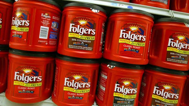 Rows of Folgers coffee canisters at grocery store