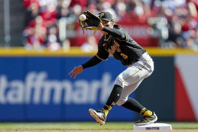 Mar 30, 2023; Cincinnati, Ohio, USA; Pittsburgh Pirates second baseman Ji Hwan Bae (3) catches a ball to force out Cincinnati Reds third baseman Spencer Steer (not pictured) in the second inning at Great American Ball Park.