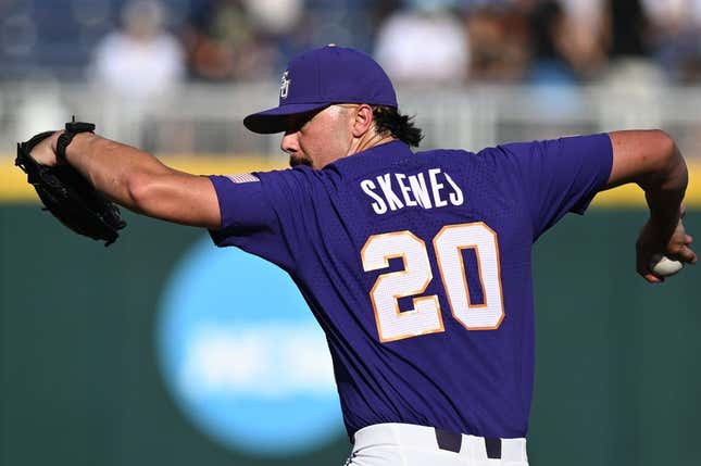 Jun 22, 2023; Omaha, NE, USA;  LSU Tigers starting pitcher Paul Skenes (20) throws against the Wake Forest Demon Deacons in the first inning at Charles Schwab Field Omaha.