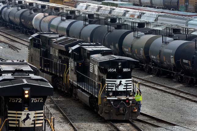 FILE - Norfolk Southern locomotives are moved through the Conway Terminal in Conway, Pa., Saturday, June 17, 2023. Norfolk Southern said Friday, Sept. 1, it believes a software defect — not a hacker — was the cause of the widespread computer outage that forced the railroad to park all of its trains for most of Monday.(AP Photo/Gene J. Puskar, File)