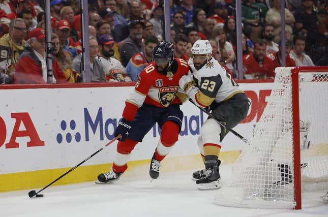 June 10, 2023; Sunrise, FL, USA; Florida Panthers left wing Anthony Duclair (10) battles for the puck against Vegas Golden Knights defenseman Alec Martinez (23) in the second period in game four of the 2023 Stanley Cup Final at FLA Live Arena.