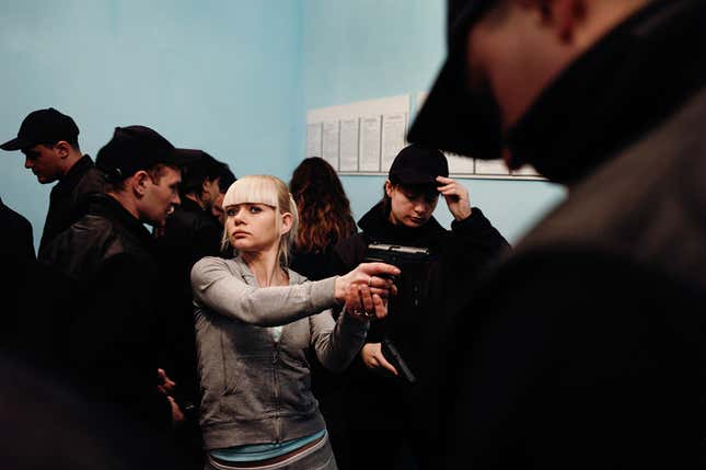 Tatiana Dyakova practicing gun safety at a firing range.