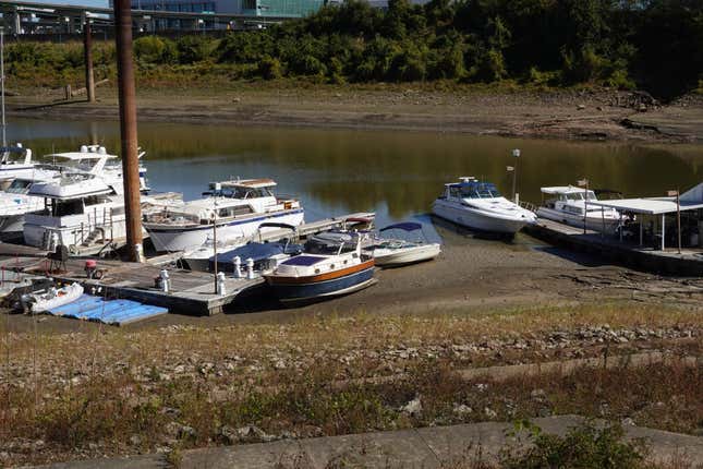 Boats rest in mud at Mud Island Marina as the water on the Mississippi River continues to recede on October 19, 2022 in Memphis, Tennessee.