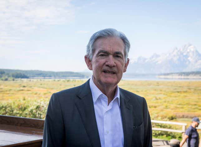 FILE - Federal Reserve Chairman Jerome Powell takes a break outside of Jackson Lake Lodge during the Jackson Hole Economic Symposium near Moran in Grand Teton National Park, Wyo., Aug. 25, 2023. Powell swore in three members of the central bank&#39;s governing board Wednesday, Sept. 13, including Philip Jefferson as vice chair and Adriana Kugler to fill a vacant seat as the central bank&#39;s first Latina governor. (AP Photo/Amber Baesler, File)