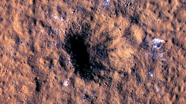 A large crater made by a meteorite impact on Amazonis Planitia.