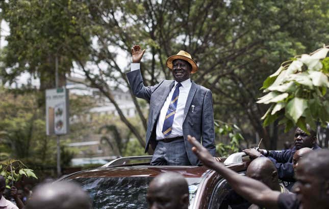 Opposition leader Raila Odinga smiles and waves to a crowd of his supporters as he leaves the Supreme Court in downtown Nairobi, Kenya Friday, Sept. 1, 2017. Kenya's Supreme Court on Friday nullified President Uhuru Kenyatta's election win last month and called for new elections within 60 days, shocking a country that had been braced for further protests by opposition supporters.