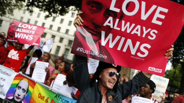 A protester holds up a placard during a demonstration against Russia’s anti-gay legislation (Reuters/Andrew Winning)