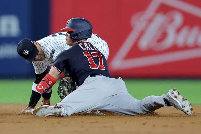 Aug 22, 2023; Bronx, New York, USA; Washington Nationals center fielder Alex Call (17) is tagged out trying to stretch a single to a double by New York Yankees second baseman Gleyber Torres (25) during the fifth inning at Yankee Stadium.