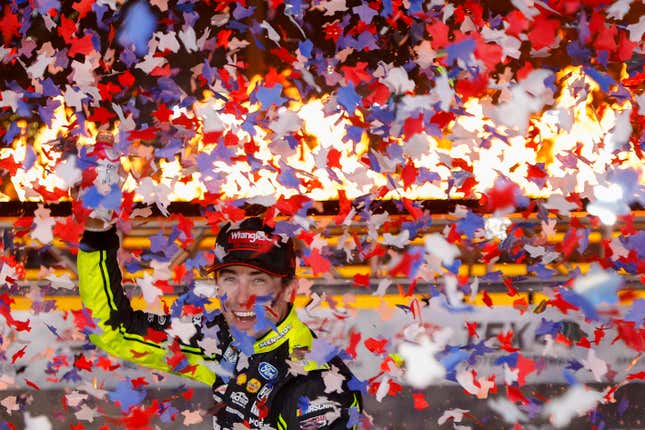 Ryan Blaney, driver of the No. 12 Menards/Wrangler Ford, celebrates in victory lane after winning the NASCAR Cup Series All-Star Race at Texas Motor Speedway on May 22, 2022 in Fort Worth, Texas.