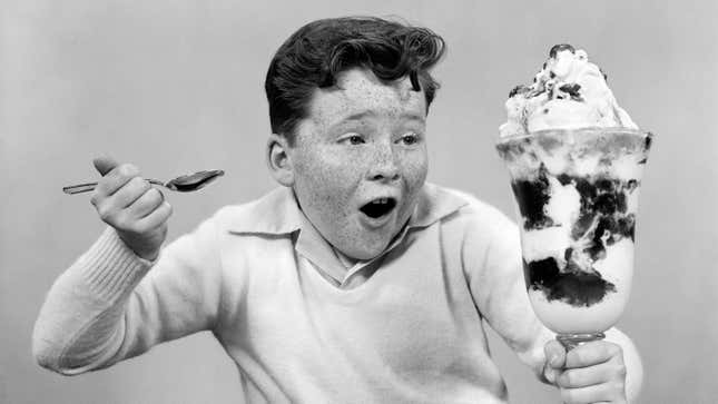 Kid with giant ice cream sundae