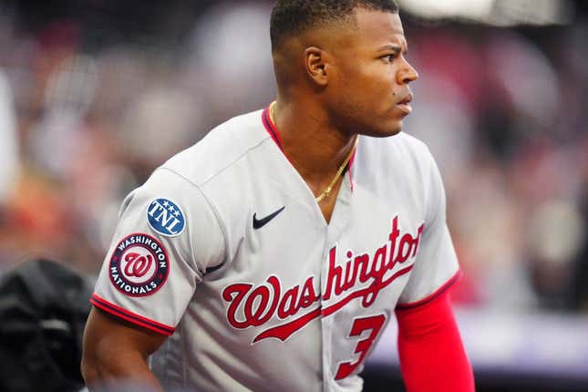 Apr 8, 2023; Denver, Colorado, USA; Washington Nationals left fielder Stone Garrett (36) heads on deck in the first inning against the Colorado Rockies at Coors Field.