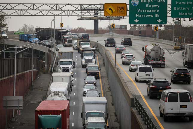 Heavy traffic moves along the Brooklyn-Queens Expressway, November 20, 2018 in the Brooklyn borough of New York City. 