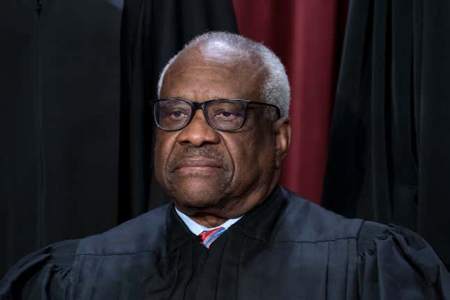 Associate Justice Clarence Thomas joins other members of the Supreme Court as they pose for a new group portrait, at the Supreme Court building in Washington, Oct. 7, 2022. Supreme Court Justice Clarence Thomas on Monday, Oct. 24, temporarily blocked Sen. Lindsey Graham’s testimony to a special grand jury investigating whether then-President Donald Trump and others illegally tried to influence the 2020 election in the state.