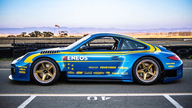 Side view of Porsche 911 GT3 STI built by DevSpeed Motorsports for Eneos.