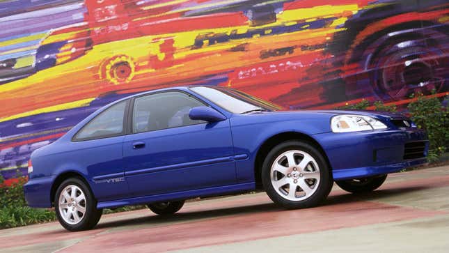 Blue EJ Civic coupe from mostly side view