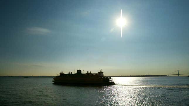 One of the Staten Island Ferries (not necessarily the John F. Kennedy) makes its way across New York harbor 