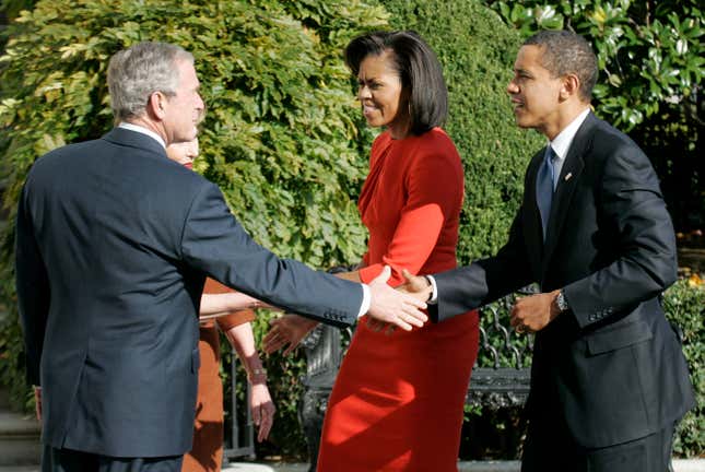 George W. Bush greets president-elect Barack Obama and his wife Michelle as they arrive to the White House in 2008.