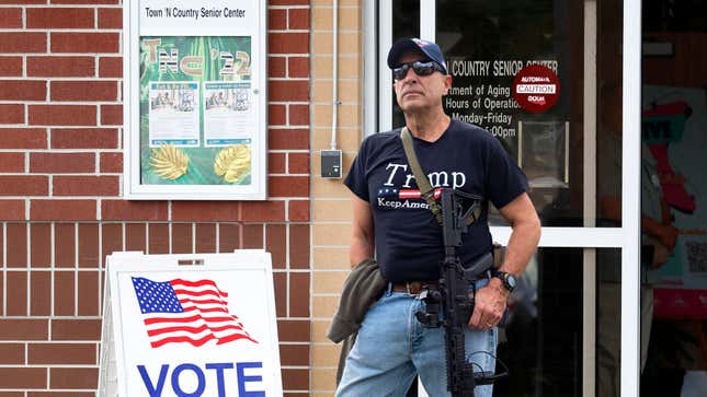 Image for article titled Armed Conservative Monitoring Polling Site Disappointed How Few People Vote In Midterms