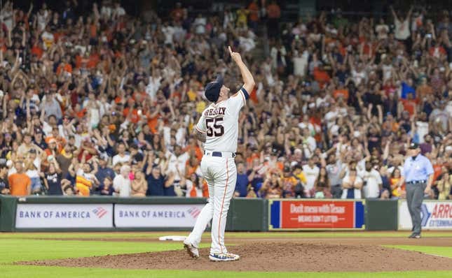 Sep 9, 2023; Houston, Texas, USA; Houston Astros relief pitcher Ryan Pressly (55) celebrates the win after defeating the San Diego Padres at Minute Maid Park.