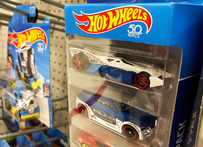 A photo of a Hot Wheels five pack on a retailer shelf.