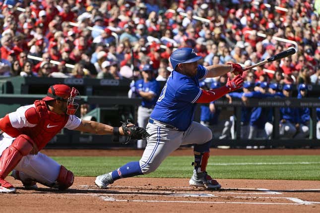 Mar 30, 2023; St. Louis, Missouri, USA;  Toronto Blue Jays catcher Alejandro Kirk (30) hits a two run single against the St. Louis Cardinals during the first inning at Busch Stadium.