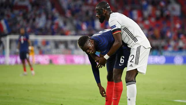 Germany’s Antoine Rüdiger shortly after taking a bit out of Paul Pogba, for some reason.